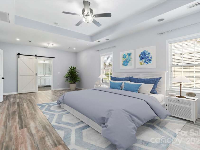 1009 Murandy Lane, Matthews, NC 28104.  MLS# CAR4272008, YatesRealty ID 4391. Virtually Staged Primary Bedroom