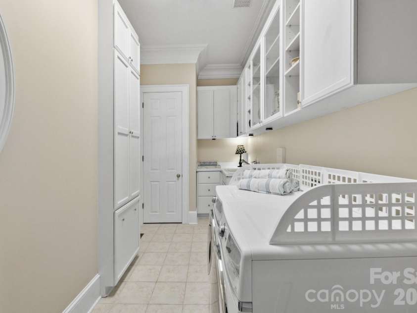 126 Watch Harbor Road, New London, NC 28127.  MLS# CAR4409631, YatesRealty ID 43926. Laundry Room