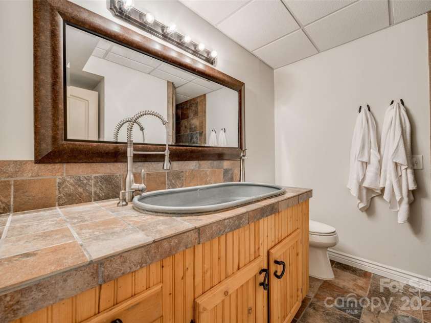 1790 Faires Road, Rock Hill, SC 29730.  MLS# CAR4235758, YatesRealty ID 4393. Full bathroom with walk-in shower and custom sink.