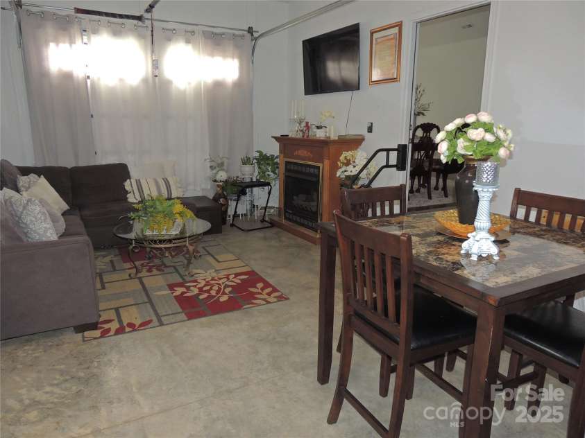 198 Reid Street, Forest City, NC 28043.  MLS# CAR4214901, YatesRealty ID 4394. Garage Den