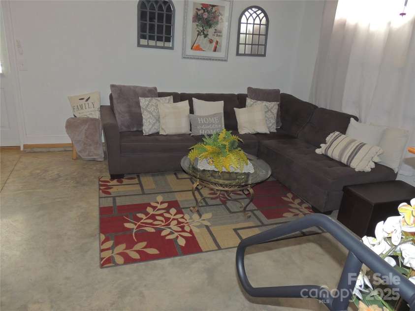 198 Reid Street, Forest City, NC 28043.  MLS# CAR4214901, YatesRealty ID 4394. Garage Den