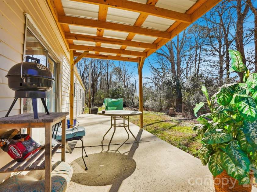 343 Carr Road, Dallas, NC 28034.  MLS# CAR4332893, YatesRealty ID 4395. Back porch