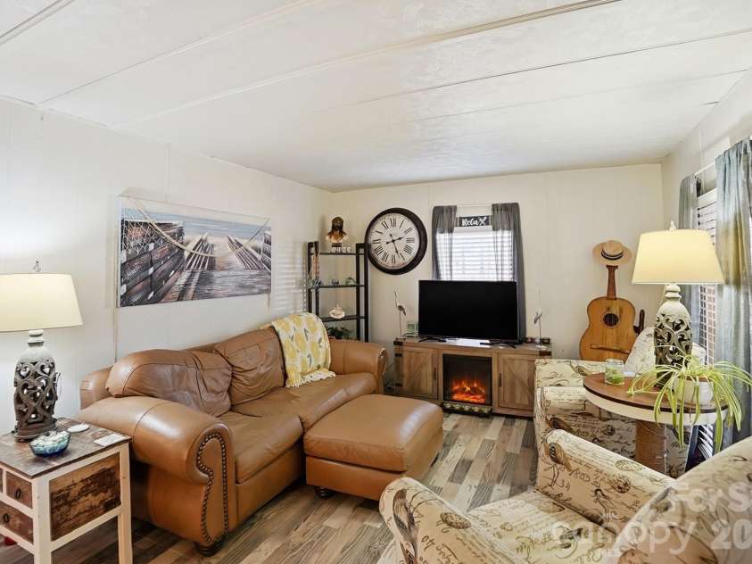 343 Carr Road, Dallas, NC 28034.  MLS# CAR4332893, YatesRealty ID 4395. Cozy living room