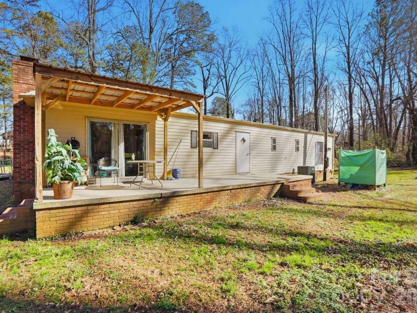 343 Carr Road, Dallas, NC 28034.  MLS# CAR4332893, YatesRealty ID 4395. Seller's father had an outdoor shower in the back yard!