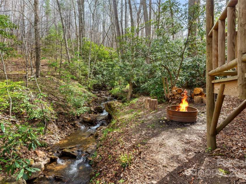 70 Fox Run, Hot Springs, NC 28743.  MLS# CAR4244597, YatesRealty ID 4396. A noisy stream down by the gazebo