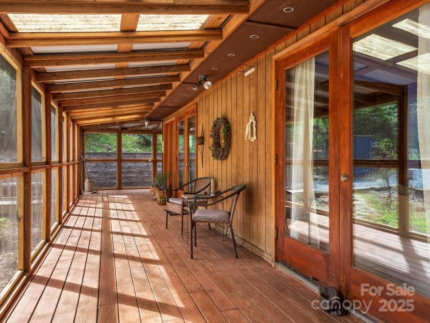 70 Fox Run, Hot Springs, NC 28743.  MLS# CAR4244597, YatesRealty ID 4396. Wrap around porches 