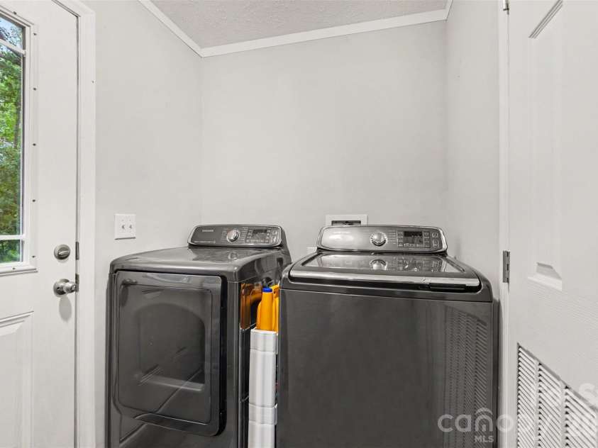 2998 Wilderness Trace, Claremont, NC 28610.  MLS# CAR4413940, YatesRealty ID 43985. Laundry Room