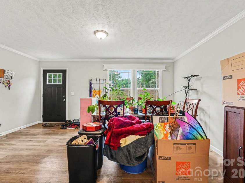 2998 Wilderness Trace, Claremont, NC 28610.  MLS# CAR4413940, YatesRealty ID 43985. Open Dining & Living Area