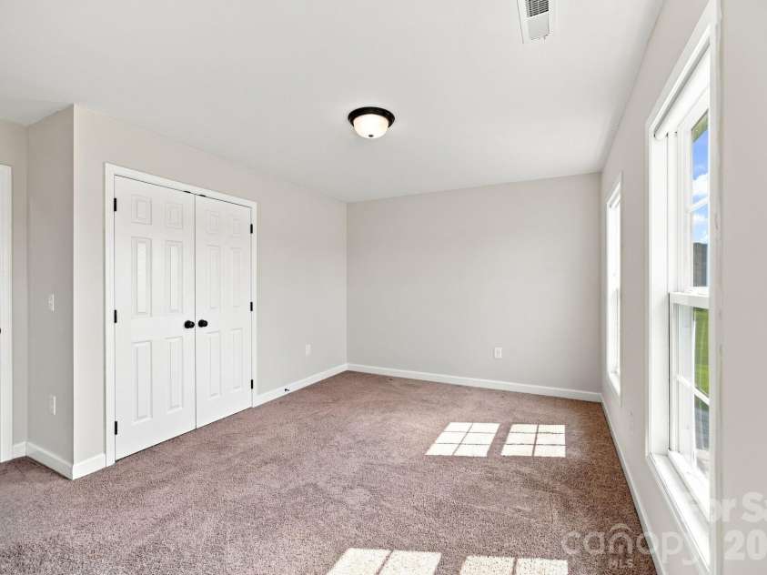 1950 Huckleberry Ridge Road, Hiddenite, NC 28636.  MLS# CAR4413318, YatesRealty ID 43994. Bedroom