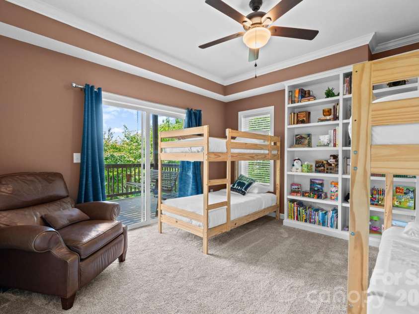 117 Pinnacle Ridge Road, Beech Mountain, NC 28604.  MLS# CAR4390771, YatesRealty ID 43995. Bunk room with access to back deck on lower level