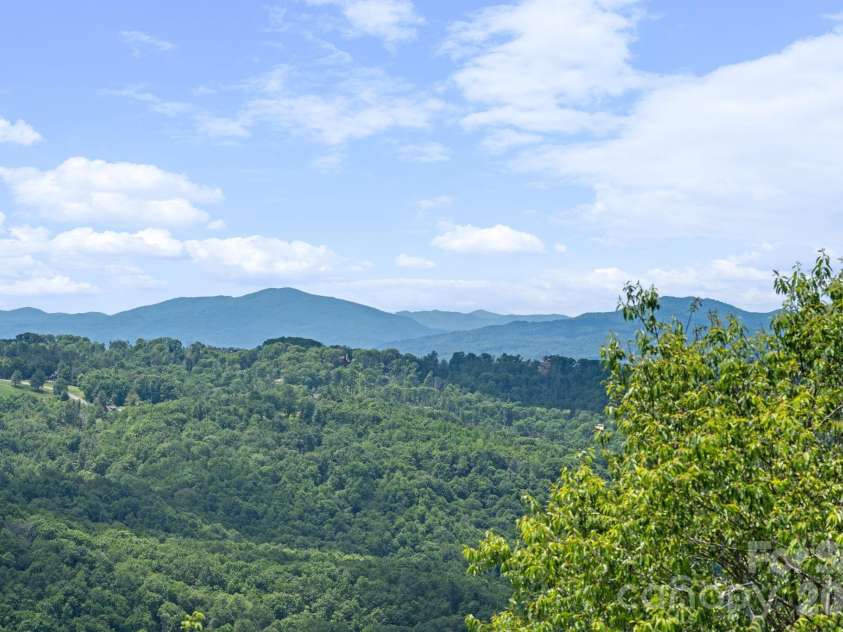 117 Pinnacle Ridge Road, Beech Mountain, NC 28604.  MLS# CAR4390771, YatesRealty ID 43995. Long range mountain views