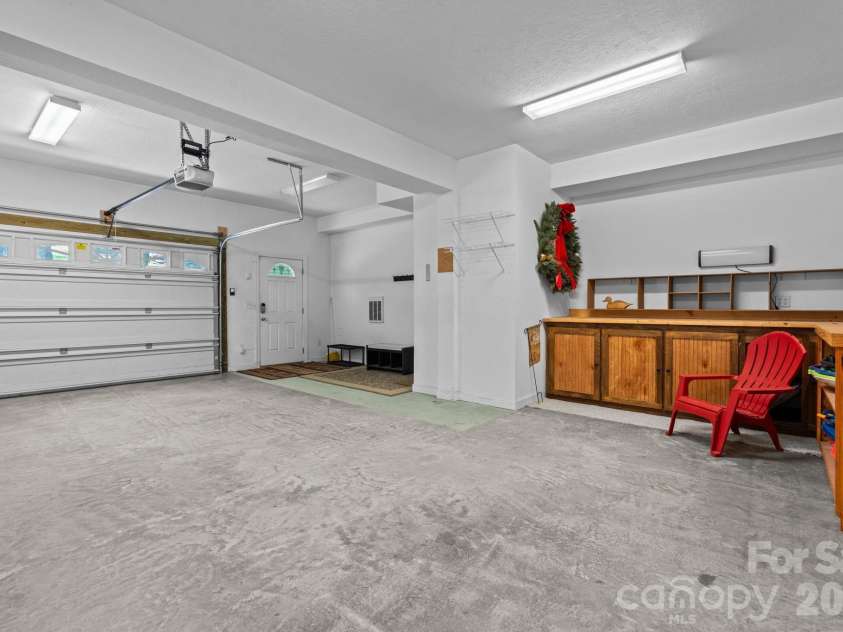 117 Pinnacle Ridge Road, Beech Mountain, NC 28604.  MLS# CAR4390771, YatesRealty ID 43995. Oversized with built in storage and work bench