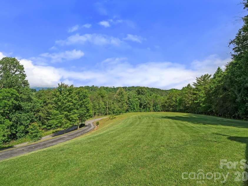 56 Gudger Road, Leicester, NC 28748.  MLS# CAR4389320, YatesRealty ID 43996. 