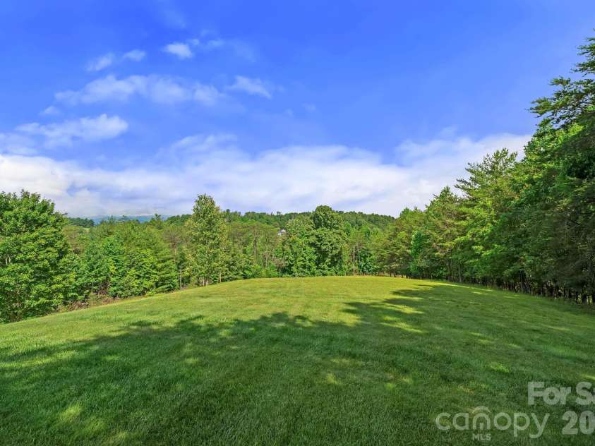 56 Gudger Road, Leicester, NC 28748.  MLS# CAR4389320, YatesRealty ID 43996. 