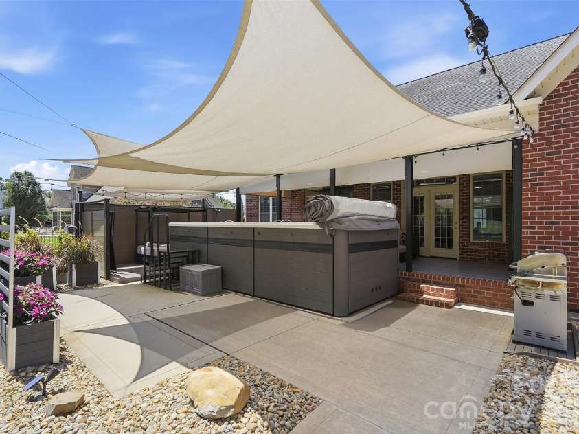 2712 Smith Field Drive, Monroe, NC 28110.  MLS# CAR4410000, YatesRealty ID 44005. Backyard Oasis with Multiple Areas to relax