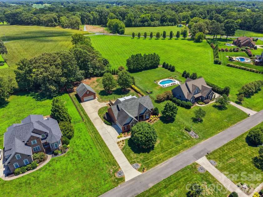 2712 Smith Field Drive, Monroe, NC 28110.  MLS# CAR4410000, YatesRealty ID 44005. Custom Home on almost an Acre Lot
