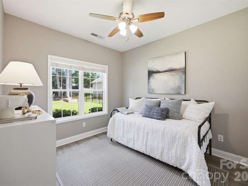 15121 Castlebridge Lane, Matthews, NC 28104.  MLS# CAR4408542, YatesRealty ID 44006. Downstairs Bedroom 2