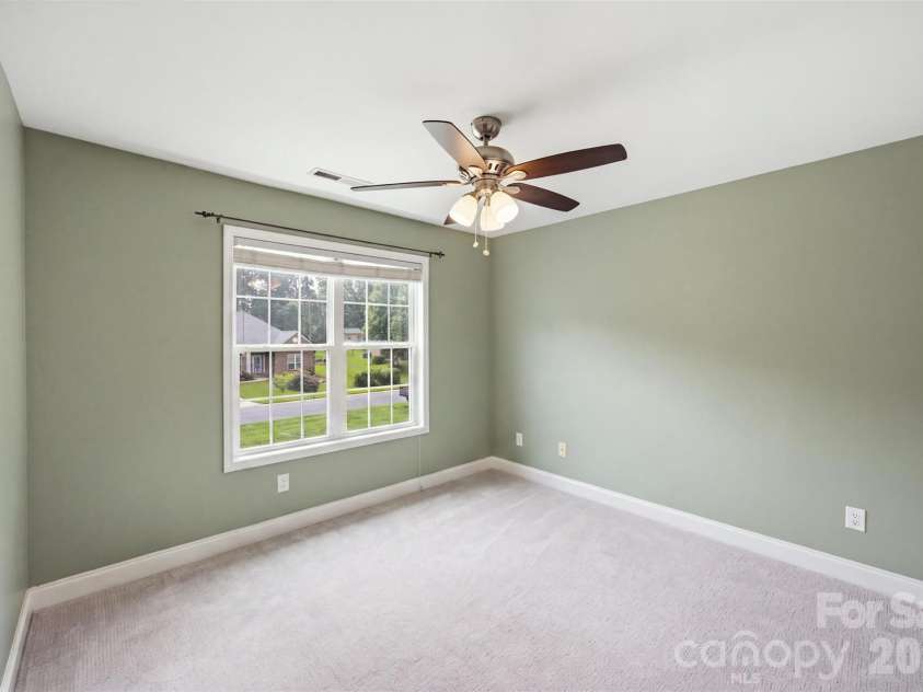 15121 Castlebridge Lane, Matthews, NC 28104.  MLS# CAR4408542, YatesRealty ID 44006. Upstairs Bedroom 4