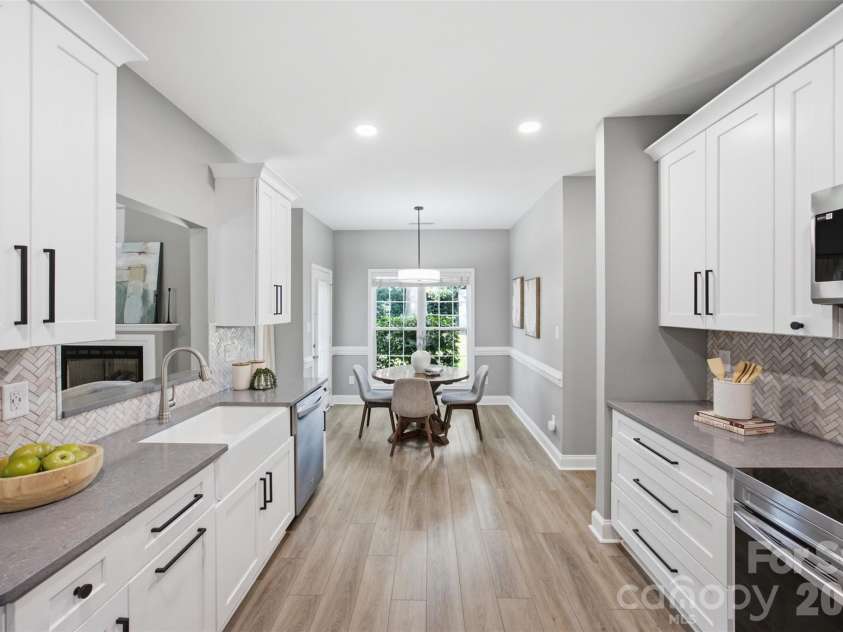 15121 Castlebridge Lane, Matthews, NC 28104.  MLS# CAR4408542, YatesRealty ID 44006. View of Breakfast Nook from Kitchen