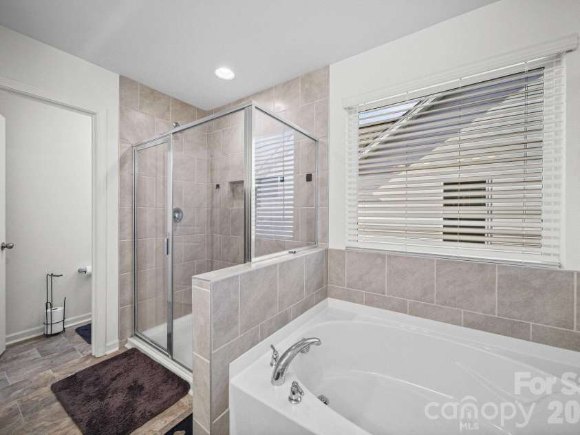 11157 Argosy Drive, Lancaster, SC 29720.  MLS# CAR4410748, YatesRealty ID 44013. Master bathtub and shower