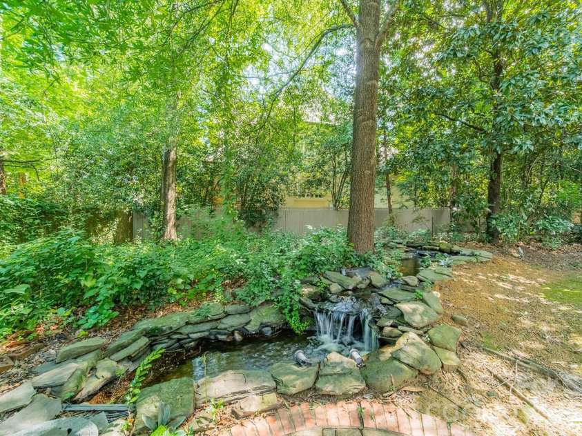 304 Canterbury Road, Charlotte, NC 28211.  MLS# CAR4411496, YatesRealty ID 44022. Tranquil water feature
