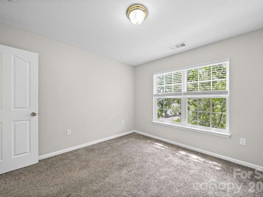 8246 Weeping Fig Lane, Charlotte, NC 28215.  MLS# CAR4413346, YatesRealty ID 44033. Bedroom 2