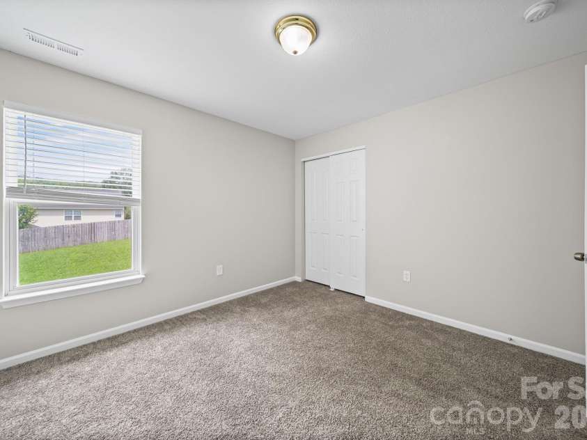 8246 Weeping Fig Lane, Charlotte, NC 28215.  MLS# CAR4413346, YatesRealty ID 44033. Bedroom 3