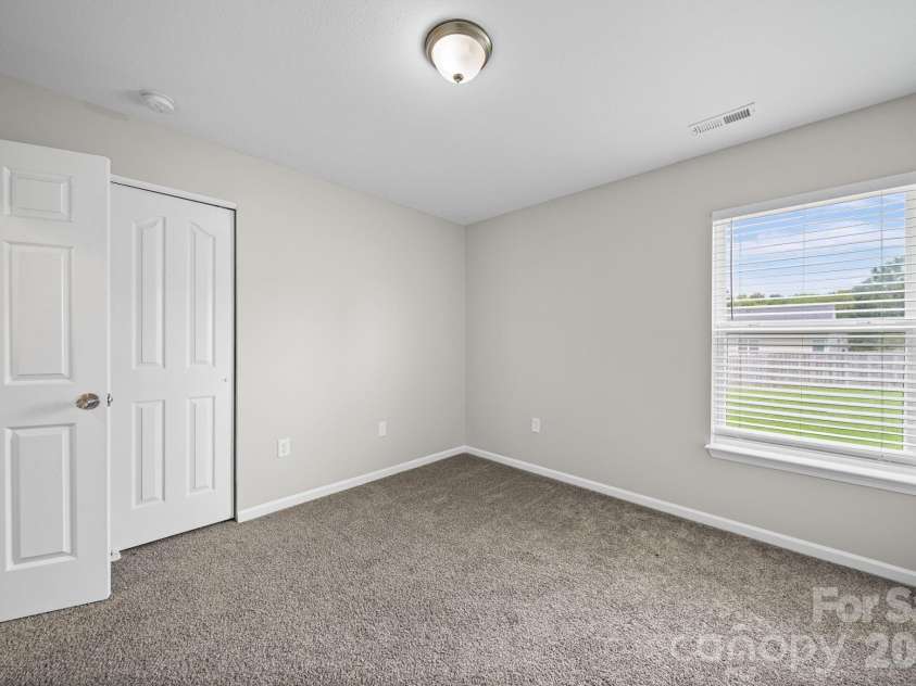 8246 Weeping Fig Lane, Charlotte, NC 28215.  MLS# CAR4413346, YatesRealty ID 44033. Bedroom 4