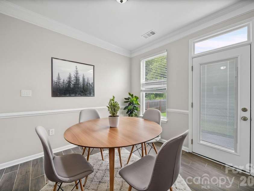 8246 Weeping Fig Lane, Charlotte, NC 28215.  MLS# CAR4413346, YatesRealty ID 44033. Breakfast Nook - Virtually Staged