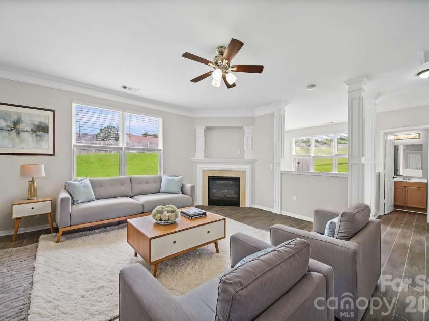 8246 Weeping Fig Lane, Charlotte, NC 28215.  MLS# CAR4413346, YatesRealty ID 44033. Great Room - Virtually Staged