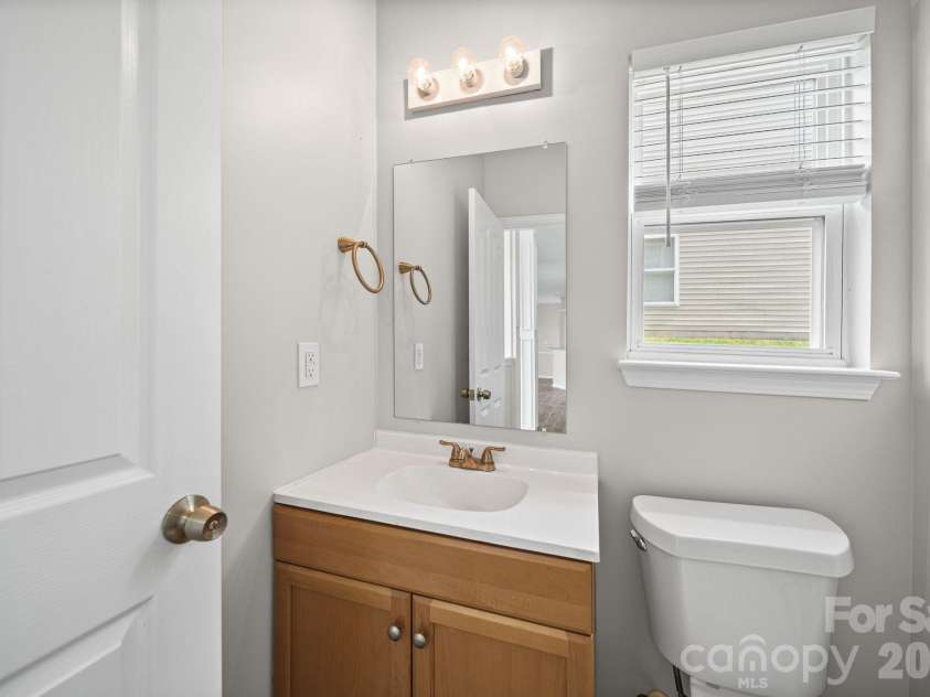 8246 Weeping Fig Lane, Charlotte, NC 28215.  MLS# CAR4413346, YatesRealty ID 44033. Powder Room