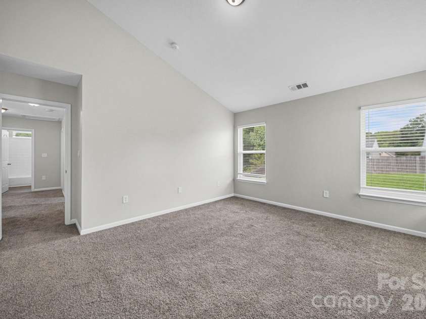8246 Weeping Fig Lane, Charlotte, NC 28215.  MLS# CAR4413346, YatesRealty ID 44033. Primary Bedroom