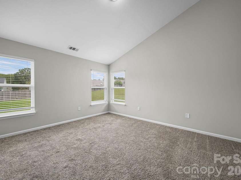 8246 Weeping Fig Lane, Charlotte, NC 28215.  MLS# CAR4413346, YatesRealty ID 44033. Primary Bedroom