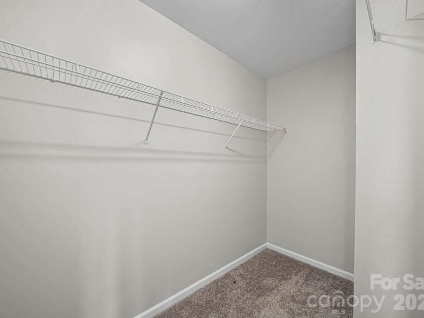 8246 Weeping Fig Lane, Charlotte, NC 28215.  MLS# CAR4413346, YatesRealty ID 44033. Primary Closet