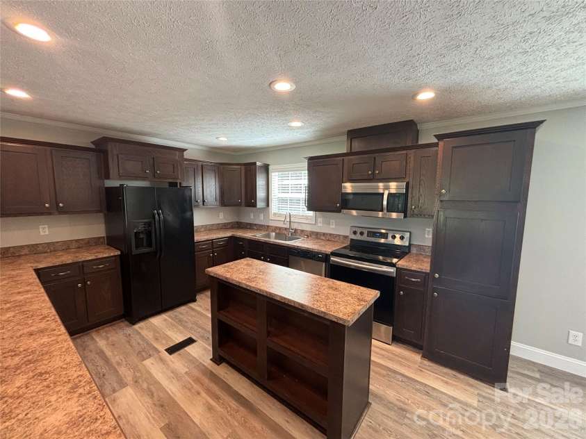 1821 Kiker Road, Peachland, NC 28133.  MLS# CAR4412485, YatesRealty ID 44035. Kitchen