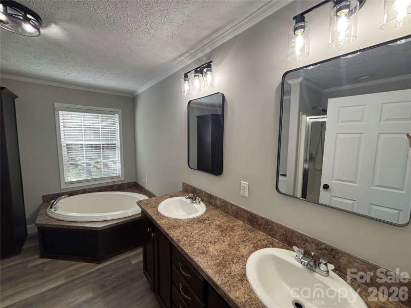 1821 Kiker Road, Peachland, NC 28133.  MLS# CAR4412485, YatesRealty ID 44035. Primary Bath