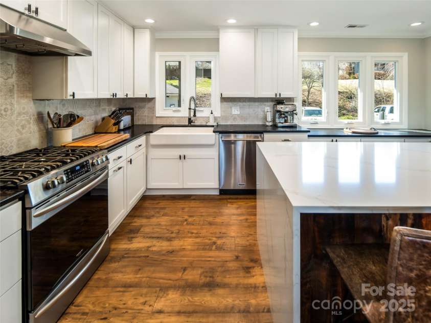 173 Glenburnie Lane, Flat Rock, NC 28731.  MLS# CAR4232971, YatesRealty ID 4404. Luxury Vinyl Planking