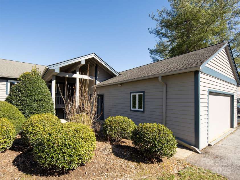 173 Glenburnie Lane, Flat Rock, NC 28731.  MLS# CAR4232971, YatesRealty ID 4404. Shared Garage with Exclusive Closet Storage