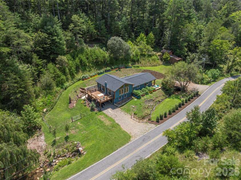 50 Embler Road, Alexander, NC 28701.  MLS# CAR4413083, YatesRealty ID 44048. 1.21 Acres surrounded by  Farmland
