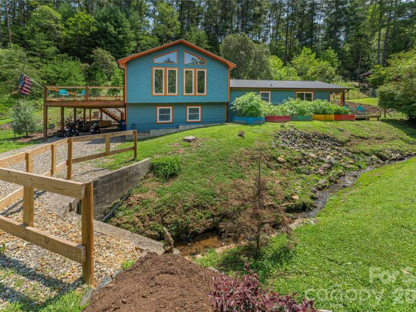 50 Embler Road, Alexander, NC 28701.  MLS# CAR4413083, YatesRealty ID 44048. Babbling Creek