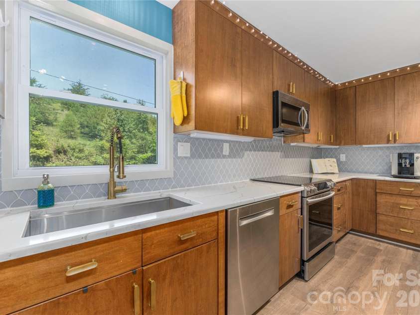 50 Embler Road, Alexander, NC 28701.  MLS# CAR4413083, YatesRealty ID 44048. Clean in peace