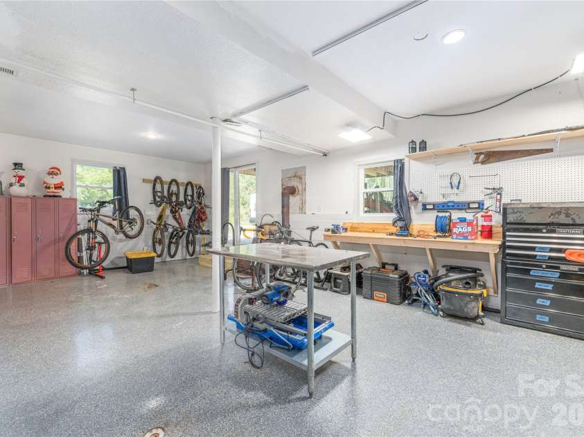 50 Embler Road, Alexander, NC 28701.  MLS# CAR4413083, YatesRealty ID 44048. Huge workshop, gym would make a great in law suite