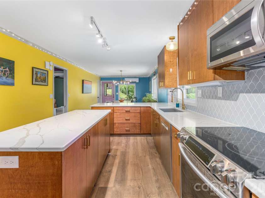 50 Embler Road, Alexander, NC 28701.  MLS# CAR4413083, YatesRealty ID 44048. Large Island for Food Prep and Entertaining