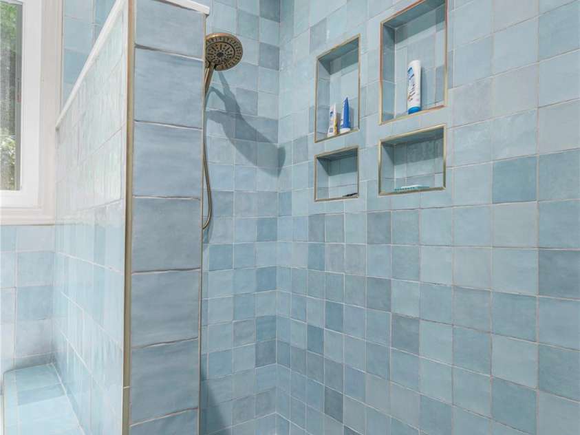 50 Embler Road, Alexander, NC 28701.  MLS# CAR4413083, YatesRealty ID 44048. Large Tiled Shower in Primary Bath
