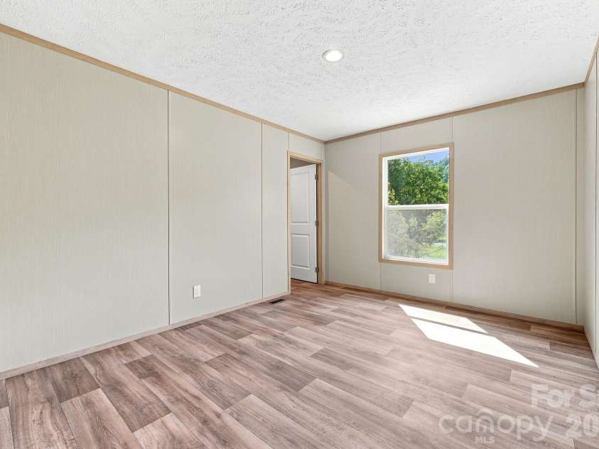 25 Caldwell Road, Waynesville, NC 28786.  MLS# CAR4414496, YatesRealty ID 44049. 