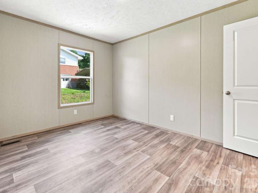 25 Caldwell Road, Waynesville, NC 28786.  MLS# CAR4414496, YatesRealty ID 44049. 