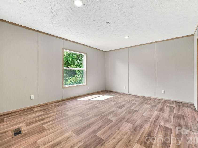 25 Caldwell Road, Waynesville, NC 28786.  MLS# CAR4414496, YatesRealty ID 44049. 