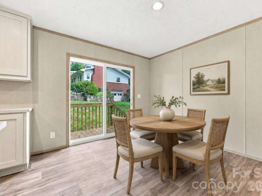 25 Caldwell Road, Waynesville, NC 28786.  MLS# CAR4414496, YatesRealty ID 44049. Virtually staged dining area