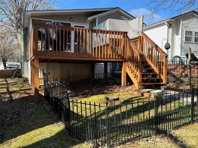 129 Club House Drive, New London, NC 28127.  MLS# CAR4350214, YatesRealty ID 4405. Fenced yard area perfect for furbabies