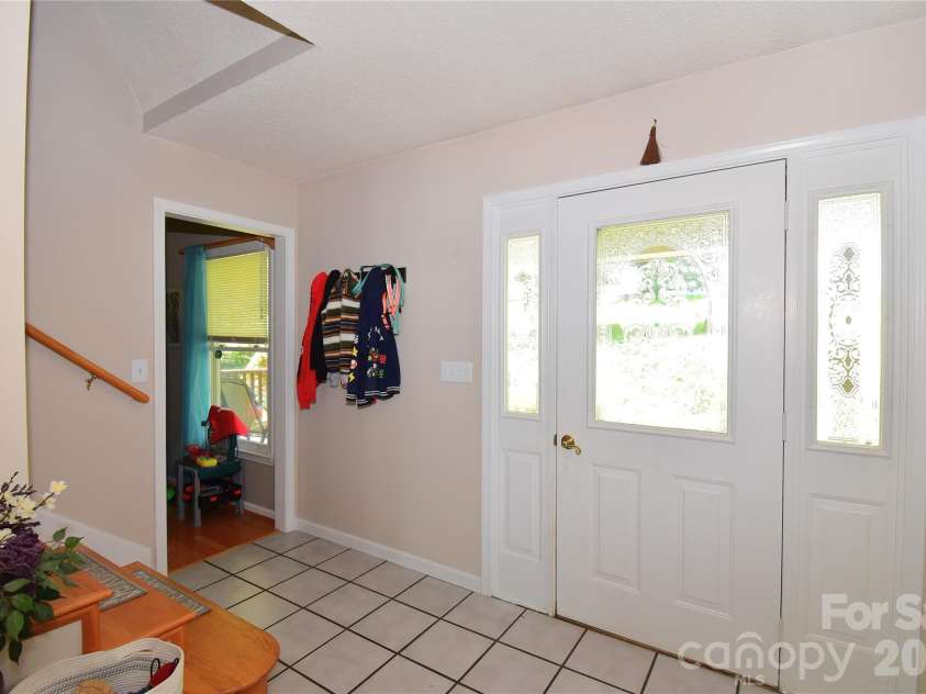 36 Cardinal Lane, Candler, NC 28715.  MLS# CAR4414046, YatesRealty ID 44055. 